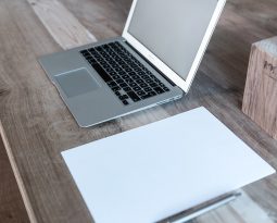 Notebook and wooden table